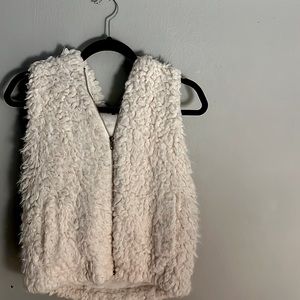 off-white fluffy vest. perfect condition and has pockets!